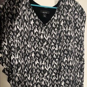 Looks like a Shaw over a black tank top